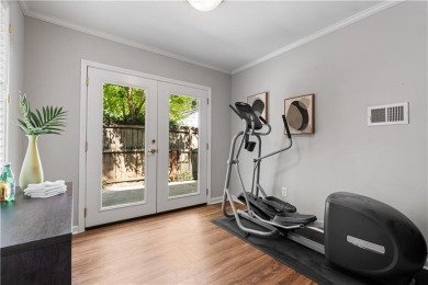 Nestled on a quiet street in sought-after Collier Hills, this on Bobby Jones Golf Club in Georgia - for sale on GolfHomes.com, golf home, golf lot