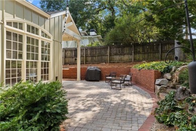 Nestled on a quiet street in sought-after Collier Hills, this on Bobby Jones Golf Club in Georgia - for sale on GolfHomes.com, golf home, golf lot