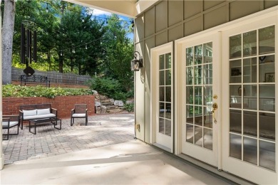 Nestled on a quiet street in sought-after Collier Hills, this on Bobby Jones Golf Club in Georgia - for sale on GolfHomes.com, golf home, golf lot