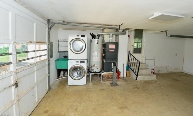 Back room can be walled w/door - would be 3rd bedroom. Washer & on Oceanview Golf Course in Virginia - for sale on GolfHomes.com, golf home, golf lot