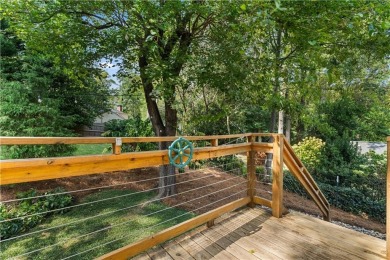 Nestled on a quiet street in sought-after Collier Hills, this on Bobby Jones Golf Club in Georgia - for sale on GolfHomes.com, golf home, golf lot