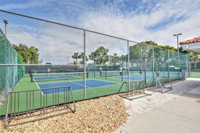 Enjoy serene water views in this bright, first-floor condo in on Bonita Fairways in Florida - for sale on GolfHomes.com, golf home, golf lot