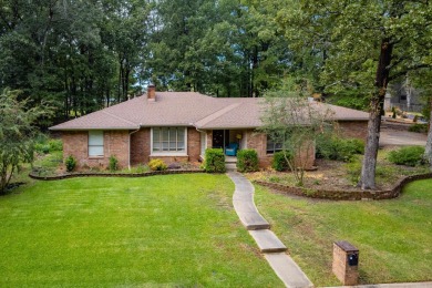 This mid-century, single-level home sits on a spacious half acre on Maumelle Golf and Country Club in Arkansas - for sale on GolfHomes.com, golf home, golf lot