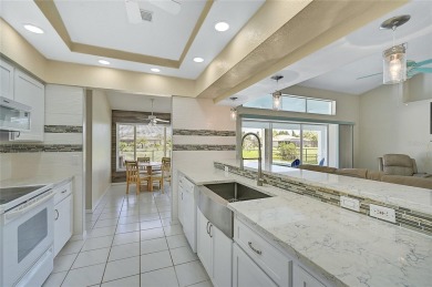 Step into your own slice of paradise with this beautifully on Pinemoor West Golf Club in Florida - for sale on GolfHomes.com, golf home, golf lot
