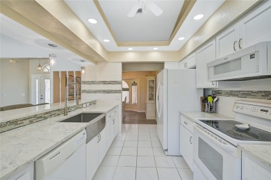 Step into your own slice of paradise with this beautifully on Pinemoor West Golf Club in Florida - for sale on GolfHomes.com, golf home, golf lot