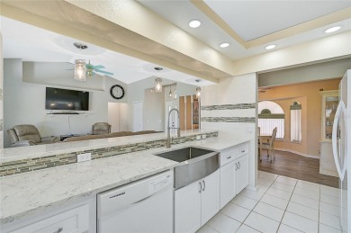 Step into your own slice of paradise with this beautifully on Pinemoor West Golf Club in Florida - for sale on GolfHomes.com, golf home, golf lot