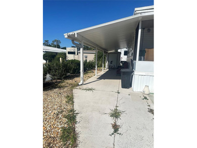 Perfect Property in Sun Air North! Discover this charming on Sun Air Golf Course in Florida - for sale on GolfHomes.com, golf home, golf lot