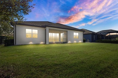 Stunning Summerville Model in Arbor Grande - Resort-Style Living on Esplanade Golf and Country at Lakewood Ranch in Florida - for sale on GolfHomes.com, golf home, golf lot