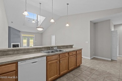 One floor living! Open and airy 2 bedroom unit in the gated golf on Brandywine Bay Golf Club in North Carolina - for sale on GolfHomes.com, golf home, golf lot