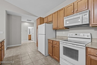 One floor living! Open and airy 2 bedroom unit in the gated golf on Brandywine Bay Golf Club in North Carolina - for sale on GolfHomes.com, golf home, golf lot