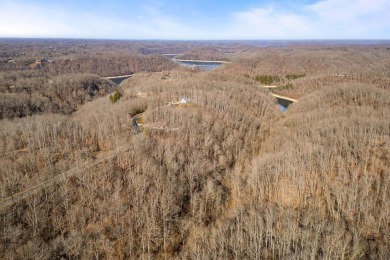 Discover the perfect blend of luxury and tranquility with this 1 on Riverwatch Golf Club in Tennessee - for sale on GolfHomes.com, golf home, golf lot