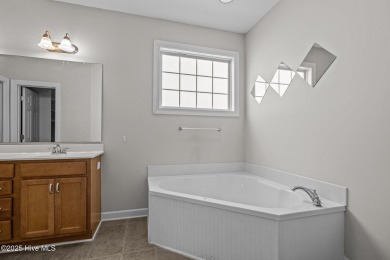 One floor living! Open and airy 2 bedroom unit in the gated golf on Brandywine Bay Golf Club in North Carolina - for sale on GolfHomes.com, golf home, golf lot