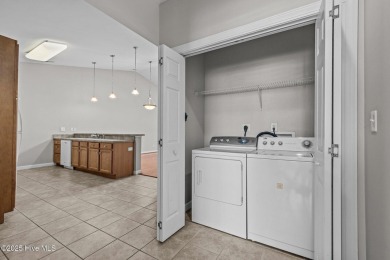 One floor living! Open and airy 2 bedroom unit in the gated golf on Brandywine Bay Golf Club in North Carolina - for sale on GolfHomes.com, golf home, golf lot