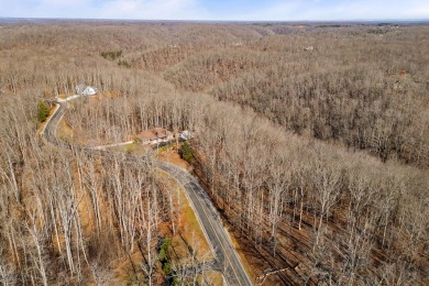 Discover the perfect blend of luxury and tranquility with this 1 on Riverwatch Golf Club in Tennessee - for sale on GolfHomes.com, golf home, golf lot