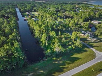 Build your dream waterfront home on this beautiful lot located on Indian Lake Estates Golf and Country Club in Florida - for sale on GolfHomes.com, golf home, golf lot