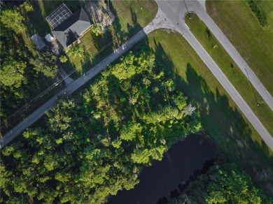 Build your dream waterfront home on this beautiful lot located on Indian Lake Estates Golf and Country Club in Florida - for sale on GolfHomes.com, golf home, golf lot