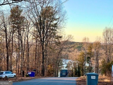 Beautiful view of mountains and water from this unrestricted lot on Currahee Golf Club in Georgia - for sale on GolfHomes.com, golf home, golf lot