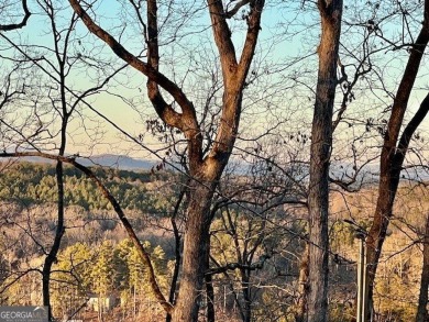 Beautiful view of mountains and water from this unrestricted lot on Currahee Golf Club in Georgia - for sale on GolfHomes.com, golf home, golf lot