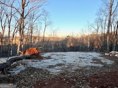 Beautiful view of mountains and water from this unrestricted lot on Currahee Golf Club in Georgia - for sale on GolfHomes.com, golf home, golf lot