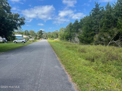 This beautiful canal-front lot on Sunrise Drive is just minutes on North River Club in North Carolina - for sale on GolfHomes.com, golf home, golf lot