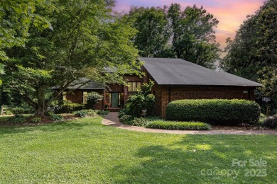 Endless possibilities! Make this waterfront retreat your primary on Woodbridge Golf Links in North Carolina - for sale on GolfHomes.com, golf home, golf lot