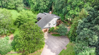 Endless possibilities! Make this waterfront retreat your primary on Woodbridge Golf Links in North Carolina - for sale on GolfHomes.com, golf home, golf lot