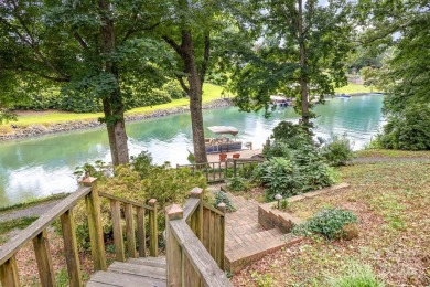 Endless possibilities! Make this waterfront retreat your primary on Woodbridge Golf Links in North Carolina - for sale on GolfHomes.com, golf home, golf lot