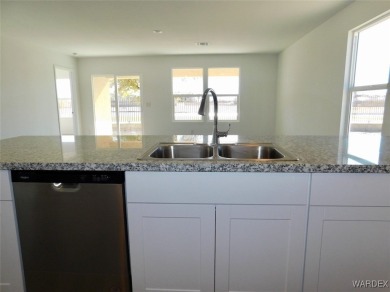 Move in to this new construction home with a beautiful view of on El Rio Golf and Country Club in Arizona - for sale on GolfHomes.com, golf home, golf lot