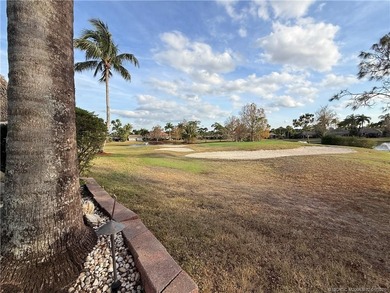 Discover a true g?m th?t r?define? luxur? and outdoor living! on St. Lucie Trail Golf Club in Florida - for sale on GolfHomes.com, golf home, golf lot