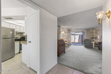 FURNISHED AND READY FOR YOU!!  This sunny, bright end unit in on Stardust Golf Course in Arizona - for sale on GolfHomes.com, golf home, golf lot