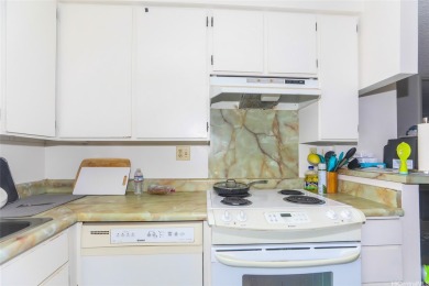 This 2 bedroom, 2 bathroom condominium with 2 parking spaces on Ala Wai Golf Course in Hawaii - for sale on GolfHomes.com, golf home, golf lot