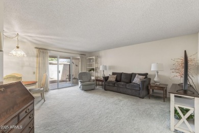 FURNISHED AND READY FOR YOU!!  This sunny, bright end unit in on Stardust Golf Course in Arizona - for sale on GolfHomes.com, golf home, golf lot