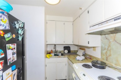 This 2 bedroom, 2 bathroom condominium with 2 parking spaces on Ala Wai Golf Course in Hawaii - for sale on GolfHomes.com, golf home, golf lot