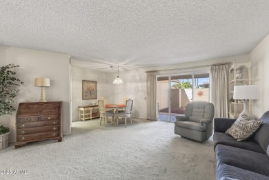 FURNISHED AND READY FOR YOU!!  This sunny, bright end unit in on Stardust Golf Course in Arizona - for sale on GolfHomes.com, golf home, golf lot