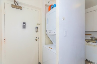 This 2 bedroom, 2 bathroom condominium with 2 parking spaces on Ala Wai Golf Course in Hawaii - for sale on GolfHomes.com, golf home, golf lot