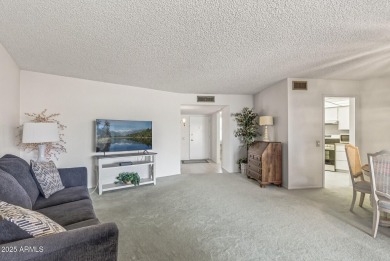 FURNISHED AND READY FOR YOU!!  This sunny, bright end unit in on Stardust Golf Course in Arizona - for sale on GolfHomes.com, golf home, golf lot