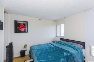 This 2 bedroom, 2 bathroom condominium with 2 parking spaces on Ala Wai Golf Course in Hawaii - for sale on GolfHomes.com, golf home, golf lot