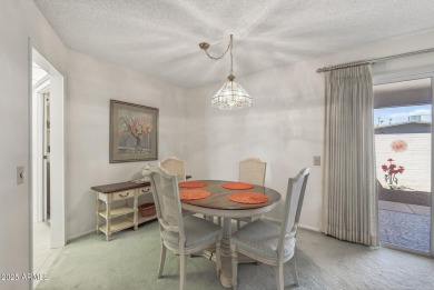 FURNISHED AND READY FOR YOU!!  This sunny, bright end unit in on Stardust Golf Course in Arizona - for sale on GolfHomes.com, golf home, golf lot