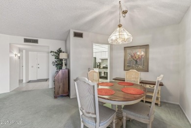 FURNISHED AND READY FOR YOU!!  This sunny, bright end unit in on Stardust Golf Course in Arizona - for sale on GolfHomes.com, golf home, golf lot