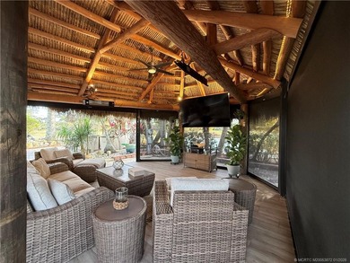 Discover a true g?m th?t r?define? luxur? and outdoor living! on St. Lucie Trail Golf Club in Florida - for sale on GolfHomes.com, golf home, golf lot