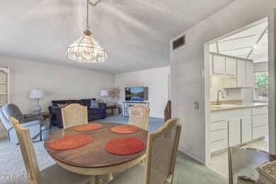FURNISHED AND READY FOR YOU!!  This sunny, bright end unit in on Stardust Golf Course in Arizona - for sale on GolfHomes.com, golf home, golf lot