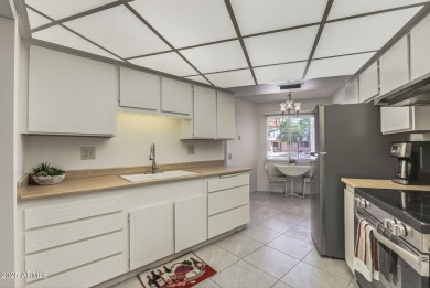 FURNISHED AND READY FOR YOU!!  This sunny, bright end unit in on Stardust Golf Course in Arizona - for sale on GolfHomes.com, golf home, golf lot