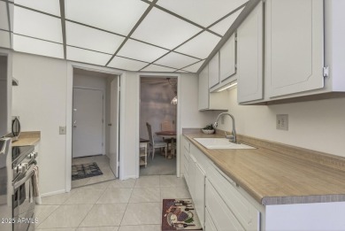 FURNISHED AND READY FOR YOU!!  This sunny, bright end unit in on Stardust Golf Course in Arizona - for sale on GolfHomes.com, golf home, golf lot