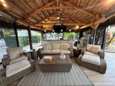 Discover a true g?m th?t r?define? luxur? and outdoor living! on St. Lucie Trail Golf Club in Florida - for sale on GolfHomes.com, golf home, golf lot