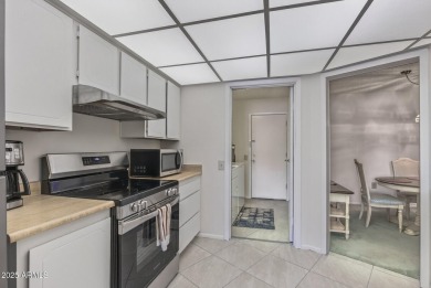 FURNISHED AND READY FOR YOU!!  This sunny, bright end unit in on Stardust Golf Course in Arizona - for sale on GolfHomes.com, golf home, golf lot