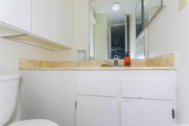 This 2 bedroom, 2 bathroom condominium with 2 parking spaces on Ala Wai Golf Course in Hawaii - for sale on GolfHomes.com, golf home, golf lot