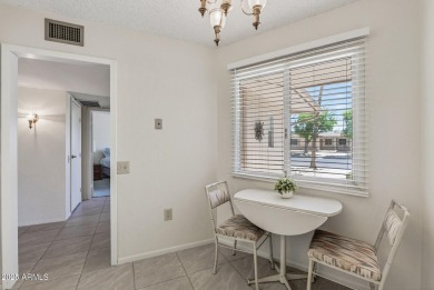 FURNISHED AND READY FOR YOU!!  This sunny, bright end unit in on Stardust Golf Course in Arizona - for sale on GolfHomes.com, golf home, golf lot