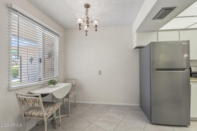 FURNISHED AND READY FOR YOU!!  This sunny, bright end unit in on Stardust Golf Course in Arizona - for sale on GolfHomes.com, golf home, golf lot