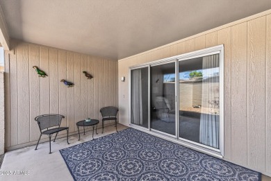 FURNISHED AND READY FOR YOU!!  This sunny, bright end unit in on Stardust Golf Course in Arizona - for sale on GolfHomes.com, golf home, golf lot