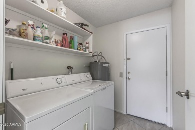 FURNISHED AND READY FOR YOU!!  This sunny, bright end unit in on Stardust Golf Course in Arizona - for sale on GolfHomes.com, golf home, golf lot